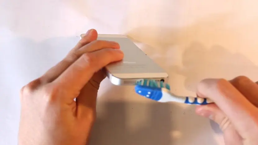Clean the charging port of your mobile phone