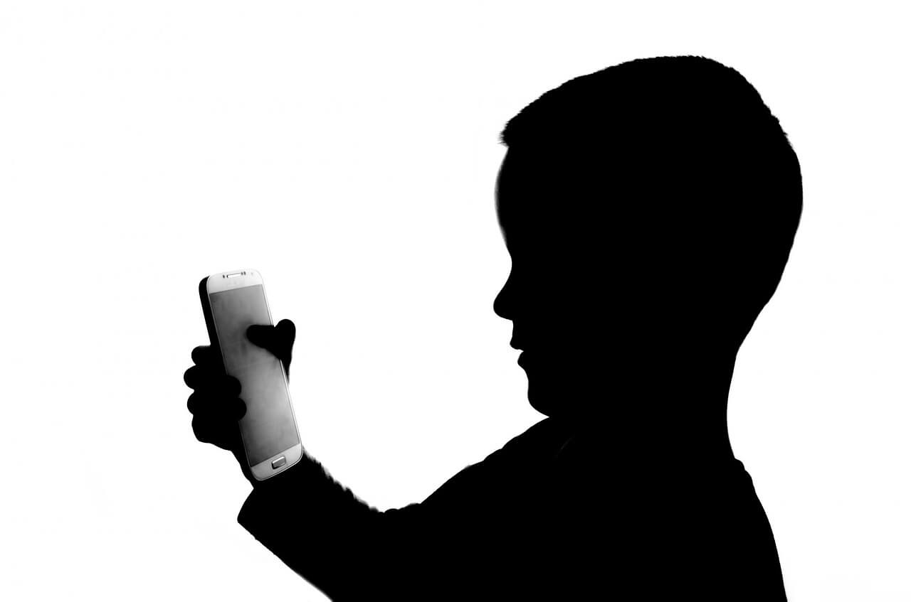 child using smartphone in 2024 - Pex
