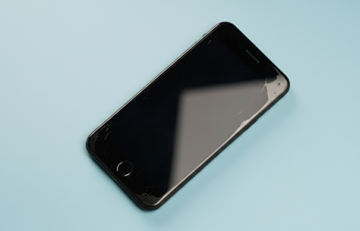 Phone screen protector showing visible bubbles and edge lift before correction
