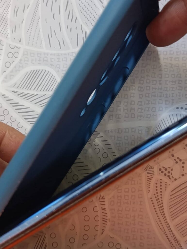 Phone lifted free along the adjoining edge of the case Phone lifted free along the adjoining edge of the case